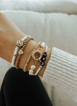 Load image into Gallery viewer, Canadian made pearl bracelet with gold nautical clasp.

